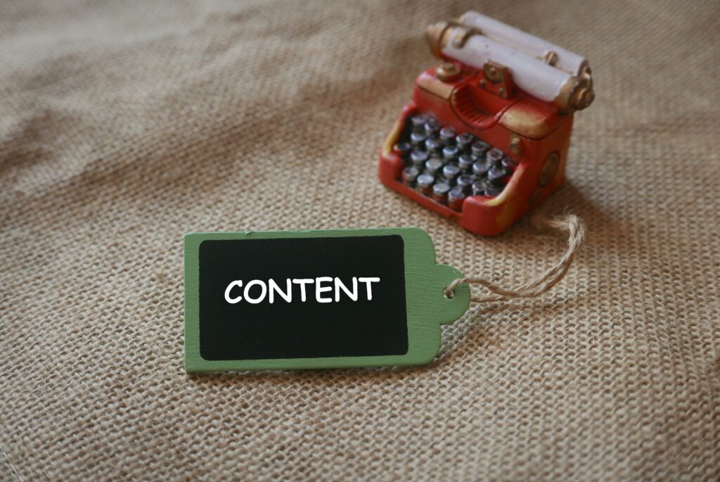 small red typewriter, content marketing, content creation, content writer, SEO writing, SEO article, SEO blog post, SEO writer, SEO management, content mamagement